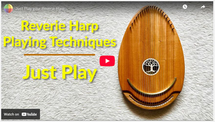 Playingthe Reverie Harp