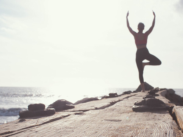 Outdoors in Inspirational Yoga Pose Outdoors in Inspirational Yoga Pose